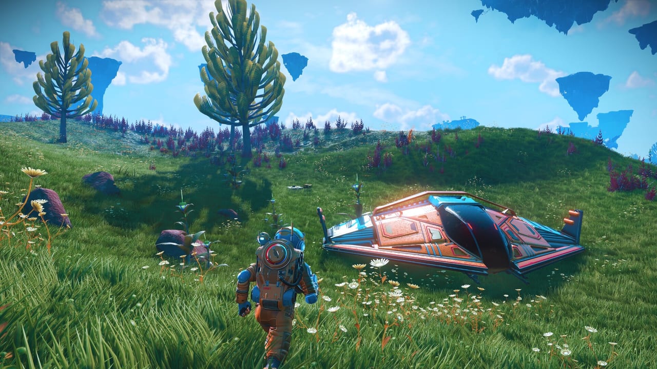 No Man's Sky screenshot of a Traveller exploring a colourful alien planet